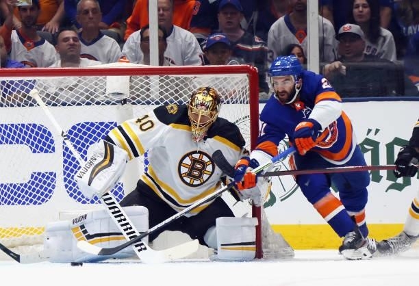 Tuukka Rask of the Boston Bruins defends the net against Kyle Palmieri of the New York Islanders during the first period in Game Four of the Second...