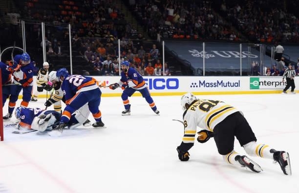 Semyon Varlamov of the New York Islanders makes the first period stop on David Pastrnak of the Boston Bruins in Game Four of the Second Round of the...