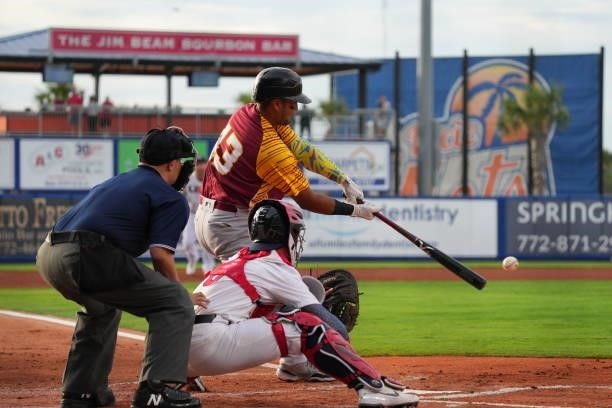 Carlos Pérez of Venezuela hits into a double play in the first inning against the United States during the WBSC Baseball Americas Qualifier Super...