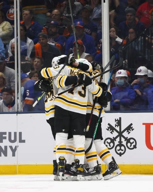 The Boston Bruins celebrate a powerplay goal by David Krejci against the New York Islanders at 3:47 of the second period in Game Four of the Second...