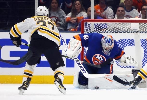 Semyon Varlamov of the New York Islanders makes the second period save against Patrice Bergeron of the Boston Bruins in Game Four of the Second Round...