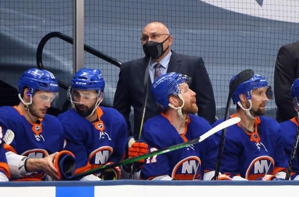 Head coach Barry Trotz of the New York Islanders handles bench duties against the Boston Bruins in Game Four of the Second Round of the 2021 NHL...