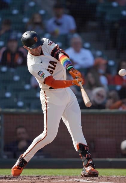 Evan Longoria of the San Francisco Giants hits a double against the Chicago Cubs in the bottom of the third inning at Oracle Park on June 05, 2021 in...
