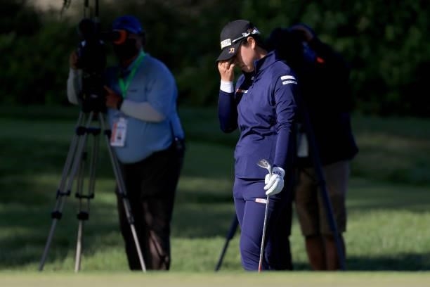 Yuka Saso of the Philippines reacts to a chip shot on the 14th hole green during the third round of the 76th U.S. Women's Open Championship at The...