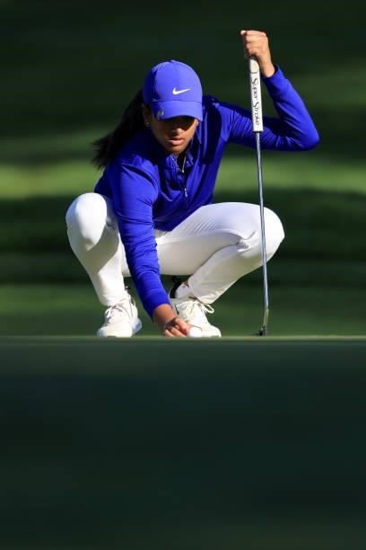 Megha Ganne of the United States lines up her putt on the 17th hole during the third round of the 76th U.S. Women's Open Championship at The Olympic...