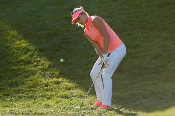 Lexi Thompson of the United States chips on the 18th hole during the third round of the 76th U.S. Women's Open Championship at The Olympic Club on...
