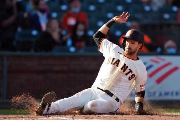 Steven Duggar of the San Francisco Giants slides into home during the game between the Chicago Cubs and the San Francisco Giants at Oracle Park on...