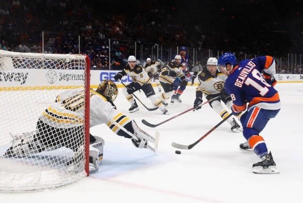 Tuukka Rask of the Boston Bruins defends the net against Anthony Beauvillier of the New York Islanders in Game Four of the Second Round of the 2021...