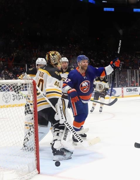 Leo Komarov of the New York Islanders celebrates the game winning goal by Mathew Barzal against Tuukka Rask of the Boston Bruins in Game Four of the...