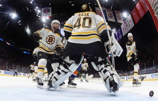 Tuukka Rask of the Boston Bruins pauses after giving up the game winning goal to Mathew Barzal of the New York Islanders in Game Four of the Second...