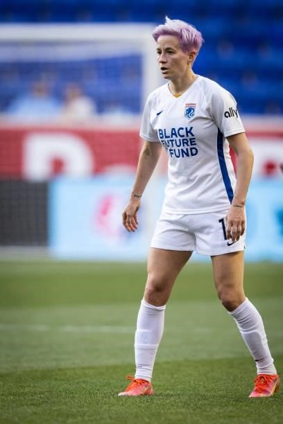 Megan Rapinoe of OL Reign watches the action during the first half of the match against NJ/NY Gotham FC at Red Bull Arena on June 5, 2021 in...