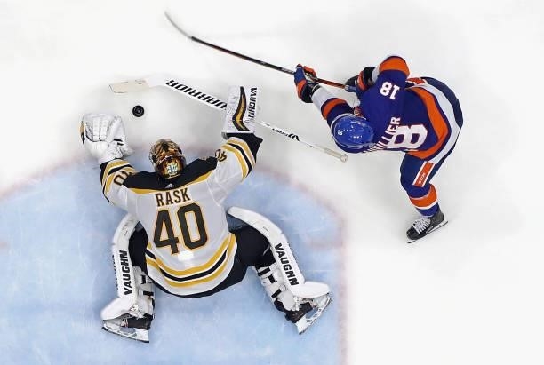 Tuukka Rask of the Boston Bruins makes the save against Anthony Beauvillier of the New York Islanders in Game Four of the Second Round of the 2021...