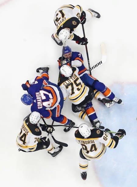 Connor Clifton of the Boston Bruins battles with Jordan Eberle of the New York Islanders during the first period in Game Four of the Second Round of...