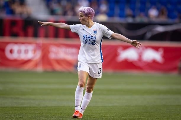 Megan Rapinoe of OL Reign signals to teammates during the first half of the game against NJ/NY Gotham FC at Red Bull Arena on June 5, 2021 in...