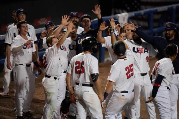 Todd Frazier of United States celebrates with teammates after hitting a homerun in the seventh inning against the during the WBSC Baseball Americas...