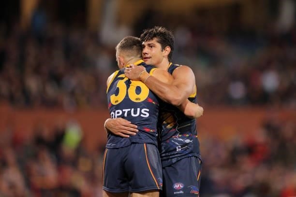 Lachlan Sholl of the Crows and Shane McAdam of the Crows celebrate during the round 12 AFL match between the Adelaide Crows and the Collingwood...