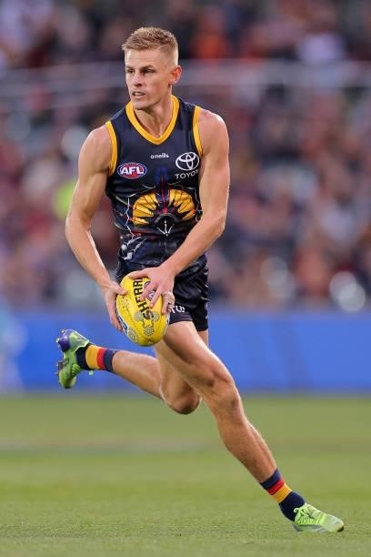 David Mackay of the Crows runs with the ball during the round 12 AFL match between the Adelaide Crows and the Collingwood Magpies at Adelaide Oval on...