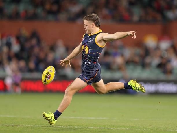 James Rowe of the Crows kicks the ball during the round 12 AFL match between the Adelaide Crows and the Collingwood Magpies at Adelaide Oval on June...