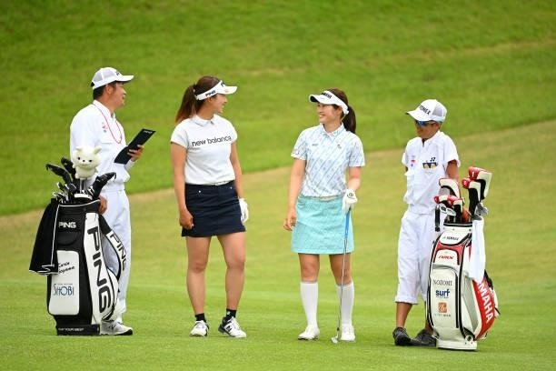 Karin Takeyama and Nozomi Uetake of Japan talk on the 9th fairway during the final round of Yonex Ladies at Yonex Country Club on June 6, 2021 in...