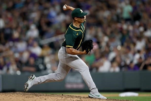 Pitcher Jesus Luzardo of the Oakland Athletics throws against the Colorado Rockies in the seventh inning at Coors Field on June 05, 2021 in Denver,...