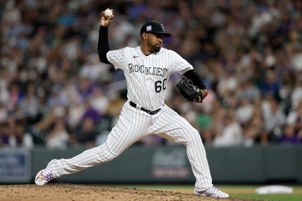 Pitcher Mychal Givens of the Colorado Rockies throws against the Oakland Athletics in the eighth inning at Coors Field on June 05, 2021 in Denver,...