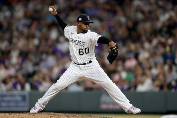 Pitcher Mychal Givens of the Colorado Rockies throws against the Oakland Athletics in the eighth inning at Coors Field on June 05, 2021 in Denver,...