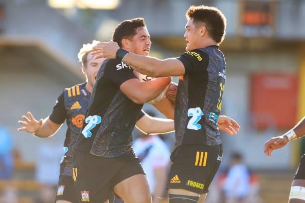 Anton Lienert-Brown of the Chiefs celebrates a try with team mates during the round four Super Rugby Trans-Tasman match between the Chiefs and the...