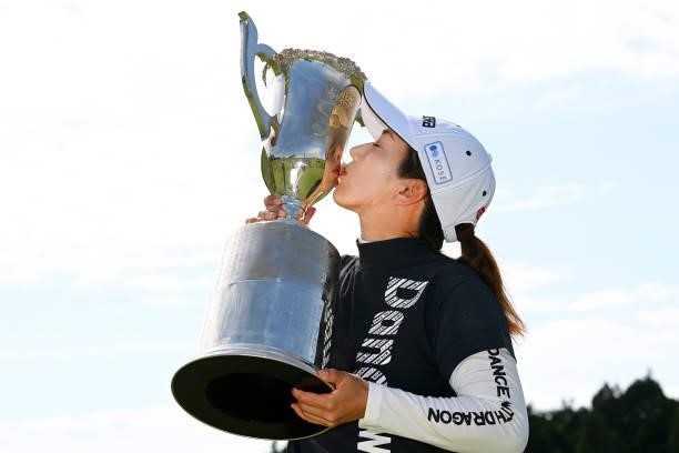 Ritsuko Ryu of Japan kisses the trophy after winning the tournament following the final round of Yonex Ladies at Yonex Country Club on June 6, 2021...