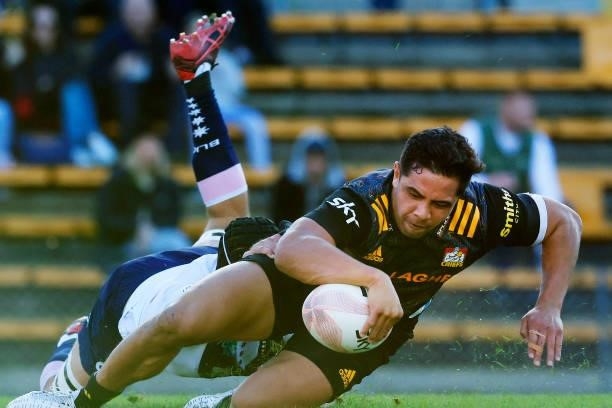 Anton Lienert-Brown of the Chiefs scores a try during the round four Super Rugby Trans-Tasman match between the Chiefs and the Melbourne Rebels at...