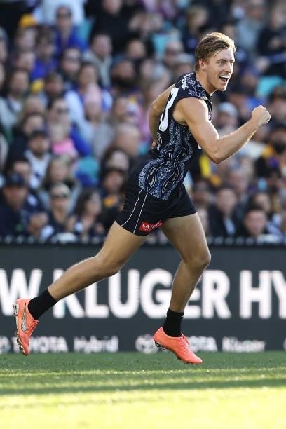 Will Setterfield of the Blues celebrates kicking a goal during the round 12 AFL match between the Carlton Blues and the West Coast Eagles at Sydney...