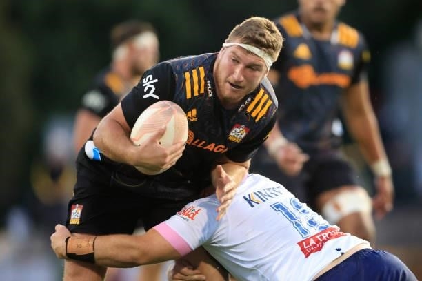 Bradley Slater of the Chiefs is tackled during the round four Super Rugby Trans-Tasman match between the Chiefs and the Melbourne Rebels at...