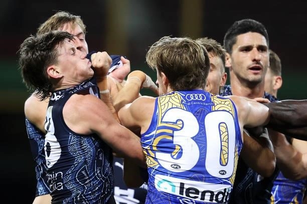 Jackson Nelson of the Eagles intervenes as Elliot Yeo of the Eagles scuffles with Sam Walsh, Will Setterfield and Patrick Cripps of the Blues during...