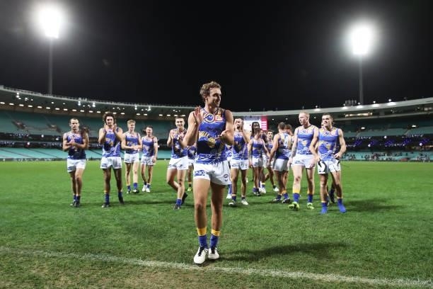Luke Edwards of the Eagles celebrates victory with team mates after the round 12 AFL match between the Carlton Blues and the West Coast Eagles at...