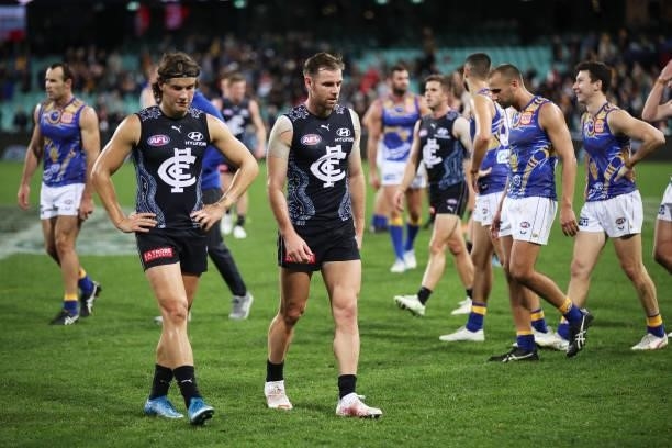 Sam Docherty and Liam Stocker of the Blues look dejected after the round 12 AFL match between the Carlton Blues and the West Coast Eagles at Sydney...
