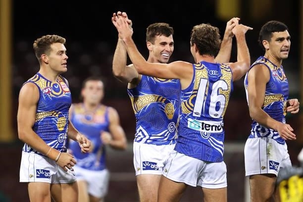 Jamie Cripps of the Eagles celebrates with his team mates after kicking a goal during the round 12 AFL match between the Carlton Blues and the West...
