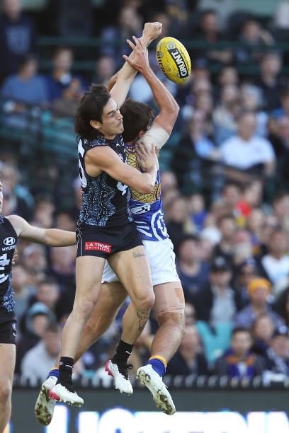 Zac Fisher of the Blues spoils during the round 12 AFL match between the Carlton Blues and the West Coast Eagles at Sydney Cricket Ground on June 06,...