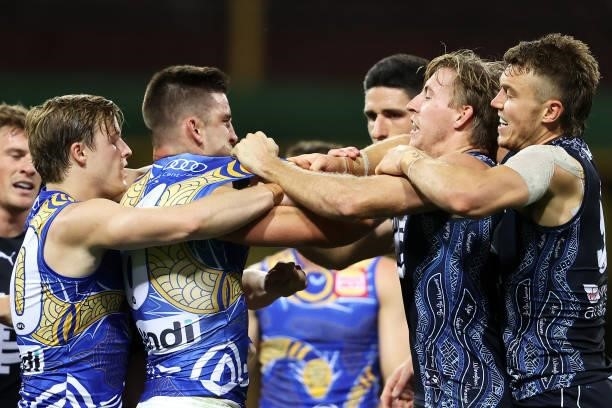 Jackson Nelson of the Eagles intervenes as Elliot Yeo of the Eagles scuffles with Will Setterfield and Patrick Cripps of the Blues during the round...