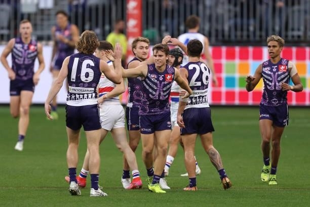 Caleb Serong of the Dockers celebrates a goal during the round 12 AFL match between the Fremantle Dockers and the Western Bulldogs at Optus Stadium...