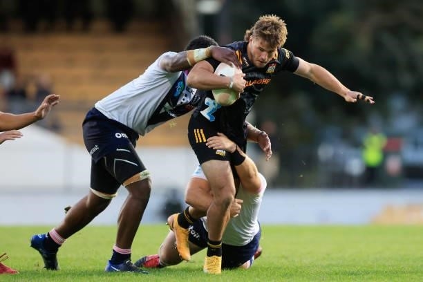 Alex Nankivell of the Chiefs is tackled during the round four Super Rugby Trans-Tasman match between the Chiefs and the Melbourne Rebels at...