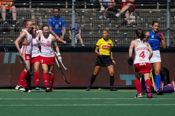 Sarah Evans of England, Ellie Rayer of England and Hollie Pearne-Webb of England celebrate their team's first goal during the Euro Hockey...