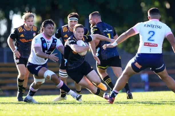 Kaleb Trask of the Chiefs runs the ball during the round four Super Rugby Trans-Tasman match between the Chiefs and the Melbourne Rebels at...