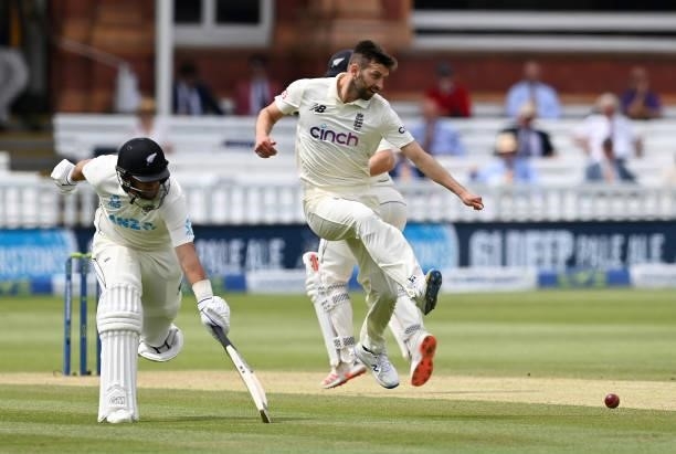 Mark Wood of England attempts to run out Ross Taylor of New Zealand by kicking the ball during Day 5 of the First LV= Insurance Test Match between...