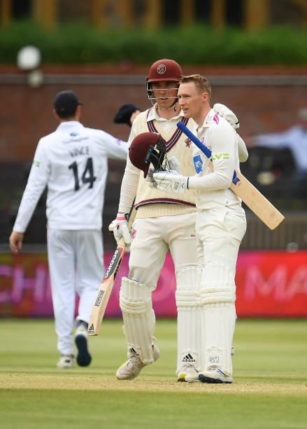 George Bartlett of Somerset celebrates after reaching their century with team mate Tom Banton during Day Four of the LV= Insurance County...