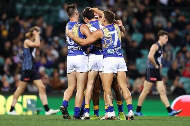 Xavier O'Neill of the Eagles celebrates with his team after kicking a goal during the round 12 AFL match between the Carlton Blues and the West Coast...