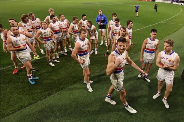 Marcus Bontempelli of the Bulldogs leads the team from the field after winning the round 12 AFL match between the Fremantle Dockers and the Western...
