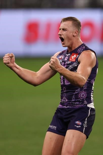Josh Treacy of the Dockers celebrates a goal during the round 12 AFL match between the Fremantle Dockers and the Western Bulldogs at Optus Stadium on...
