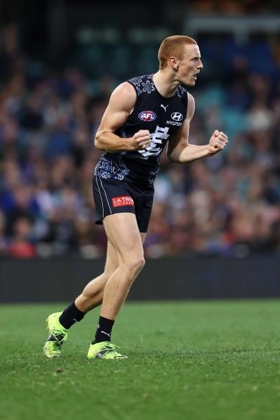 Matt Cottrell of the Blues celebrates kicking a goal during the round 12 AFL match between the Carlton Blues and the West Coast Eagles at Sydney...