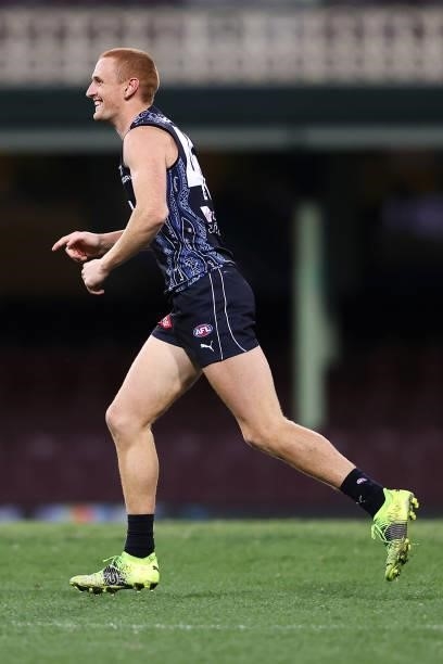Matt Cottrell of the Blues celebrates kicking a goal during the round 12 AFL match between the Carlton Blues and the West Coast Eagles at Sydney...