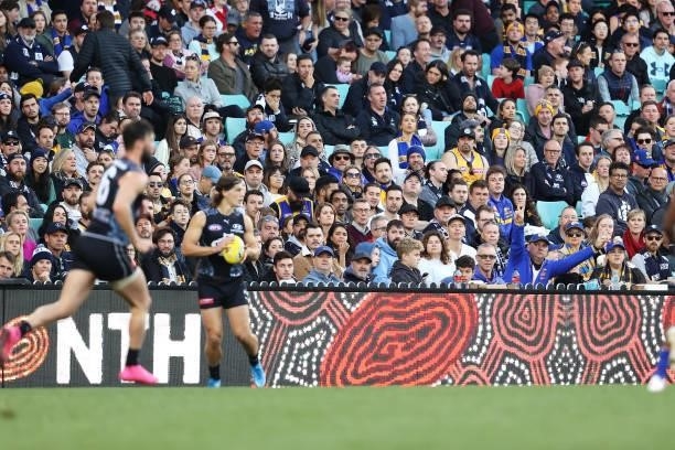 The crowd watches on during the round 12 AFL match between the Carlton Blues and the West Coast Eagles at Sydney Cricket Ground on June 06, 2021 in...
