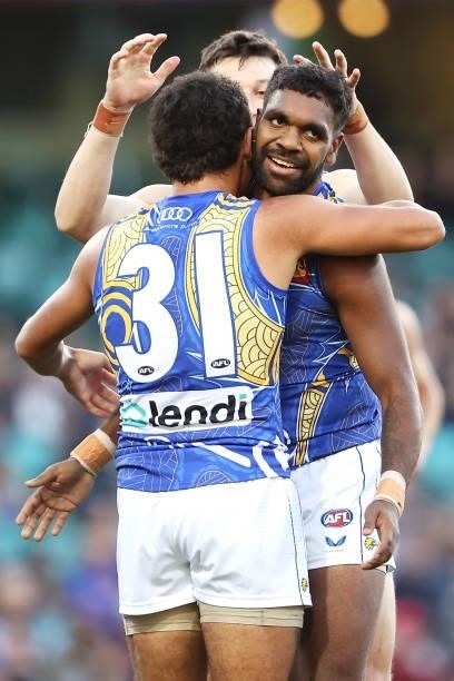 Jamaine Jones of the Eagles celebrates with Liam Ryan of the Eagles after kicking goal during the round 12 AFL match between the Carlton Blues and...